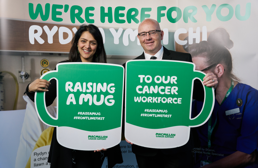 Natasha Asghar MS raising a mug at Macmillan’s coffee morning in the Senedd this week.