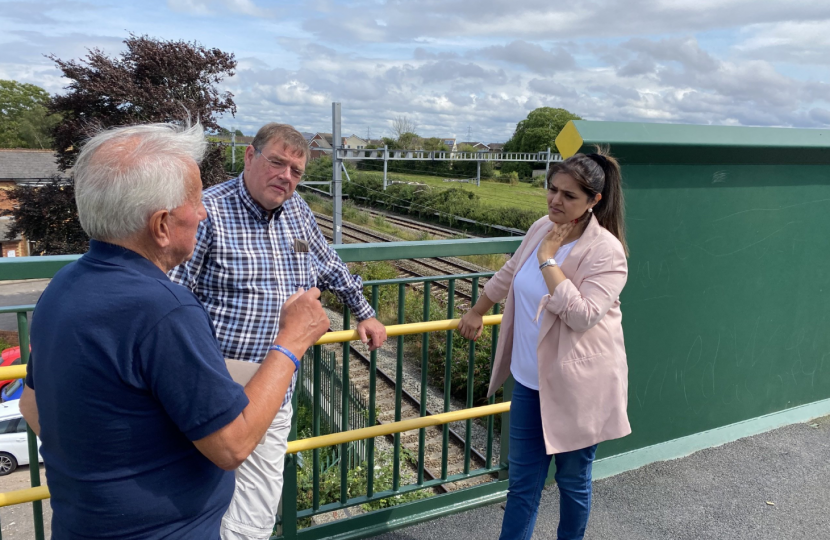 Natasha Asghar MS talking with members of the MAGOR group when she visited them last summer.