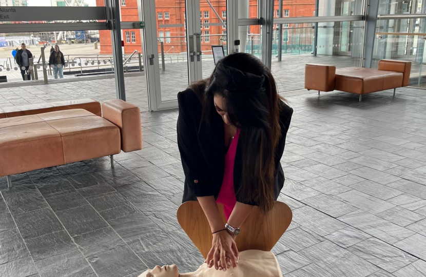 Natasha Asghar MS giving CPR.