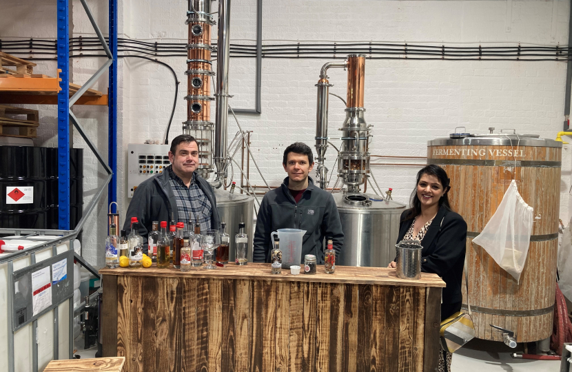 Picture shows Natasha Asghar MS with Spirit of Wales Chief Executive, Daniel Dyer, and Head Distiller, James Gibbons