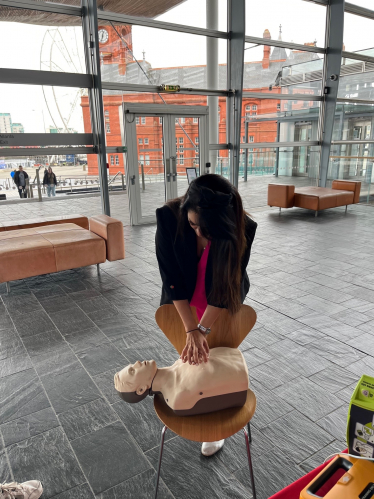 Natasha Asghar MS giving CPR.