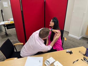 Natasha Asghar MS receiving her winter flu jab.